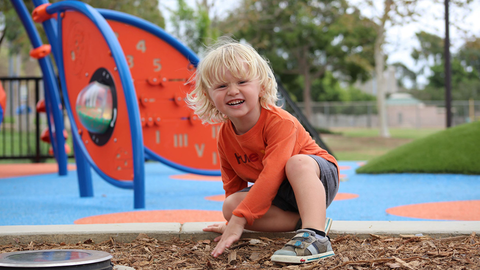 Child at Poinsettia playground