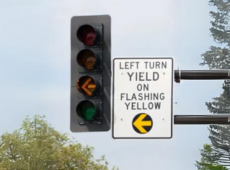 Left turn yield traffic signal