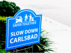 Slow down Carlsbad sign